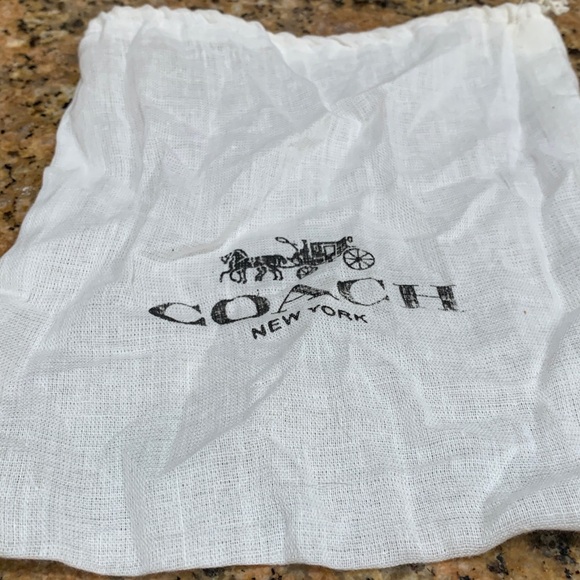 Authentic brand new smaller size Coach New York linen dust bag with Coach logo.